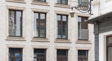 urban renovation white brick brown aluminium profiles