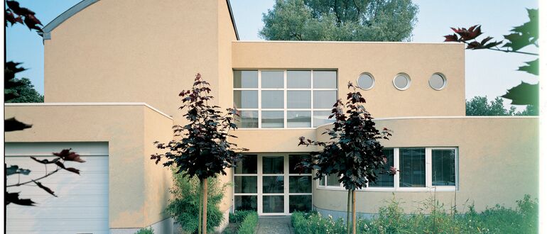 Old building style with yellow bricks.